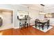 View of the dining area, eat-in kitchen, and entryway in this open-concept living space at 211 Colonial Homes Nw Dr # 2501, Atlanta, GA 30309