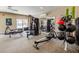 Brightly lit gym featuring weight machines, mirrors, and ample workout space at 211 Colonial Homes Nw Dr # 2501, Atlanta, GA 30309