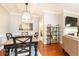 Inviting living room and dining area with hardwood floors, fireplace, and natural light at 211 Colonial Homes Nw Dr # 2501, Atlanta, GA 30309