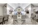 Open-concept living room showcasing high ceilings, fireplace, and stylish furnishings at 211 Colonial Homes Nw Dr # 2501, Atlanta, GA 30309
