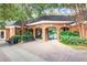 Pool entrance with brick archway, benches, and well-maintained landscaping at 211 Colonial Homes Nw Dr # 2501, Atlanta, GA 30309