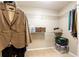 Walk-in closet with shelving and hanging storage at 211 Colonial Homes Nw Dr # 2501, Atlanta, GA 30309