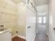 Laundry room featuring updated appliances and storage at 345 Alderwood Ln, Sandy Springs, GA 30328