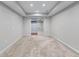 Spacious bedroom with neutral carpet, white walls, and a closet offering plenty of storage space at 350 Paces Dr, Lithia Springs, GA 30122