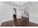 Elegant dining room with hardwood floors, coffered ceiling, and chandelier lighting at 350 Paces Dr, Lithia Springs, GA 30122