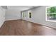 Bright living room with tile floors, multiple windows and door to the outside at 350 Paces Dr, Lithia Springs, GA 30122
