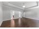 Spacious main bedroom boasts hardwood floors, tray ceiling, and ensuite bathroom access at 350 Paces Dr, Lithia Springs, GA 30122