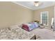 This bedroom features carpet, a ceiling fan, and two twin beds at 827 Fraser Se St, Atlanta, GA 30315