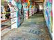 Urban tunnel with colorful graffiti art covering the walls and support columns at 827 Fraser Se St, Atlanta, GA 30315
