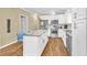 Well-lit kitchen featuring stainless steel appliances, granite countertops, and a center island at 827 Fraser Se St, Atlanta, GA 30315