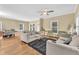 Spacious living room with hardwood floors, neutral paint, and an open layout perfect for entertaining at 827 Fraser Se St, Atlanta, GA 30315