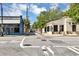 Street scene with cafes and boutiques, featuring vintage architecture and greenery at 827 Fraser Se St, Atlanta, GA 30315