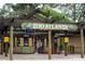 Entrance to Zoo Atlanta, featuring ticket booths and wooden overhead structure at 827 Fraser Se St, Atlanta, GA 30315