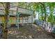View of the backyard with a deck at 3524 Forest Downs Cv, Decatur, GA 30034