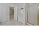 Primary bathroom featuring a soaking tub, shower and marble floors at 3524 Forest Downs Cv, Decatur, GA 30034