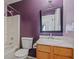 Full bathroom with shower-tub combo, wood vanity and single sink with marble countertop at 3524 Forest Downs Cv, Decatur, GA 30034