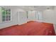 Spacious bedroom featuring two large windows and a closet at 3524 Forest Downs Cv, Decatur, GA 30034