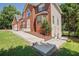 Beautiful two-story brick house featuring attached garage and landscaped yard at 3524 Forest Downs Cv, Decatur, GA 30034