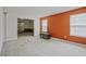 Bright living room with carpeted floors, featuring neutral walls, and large windows for natural light at 3524 Forest Downs Cv, Decatur, GA 30034