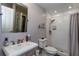 This bathroom features a classic pedestal sink, toilet, and enclosed shower at 72 Sutton Pl, Avondale Estates, GA 30002