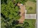 Aerial view of a charming home surrounded by lush greenery and a well-maintained yard at 1080 Rackley Nw Way, Kennesaw, GA 30144