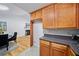 Open kitchen featuring granite counters, stainless sink, and a view into the living room at 1080 Rackley Nw Way, Kennesaw, GA 30144