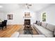 Bright living room with fireplace, vaulted ceilings, hardwood floors and modern decor at 1080 Rackley Nw Way, Kennesaw, GA 30144