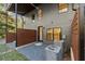 The backyard patio leads into the house through a sliding glass door at 2325 Mason Dr # D22, Atlanta, GA 30316