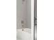 Modern bathroom shower featuring gray tile, shower head, and modern faucet at 2325 Mason Dr # D22, Atlanta, GA 30316