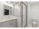 Contemporary bathroom featuring a glass-enclosed shower, modern vanity, and fixtures at 2325 Mason Dr # D22, Atlanta, GA 30316