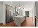 Modern kitchen with stainless steel appliances, sleek gray cabinets, and a stylish center island at 2325 Mason Dr # D22, Atlanta, GA 30316