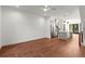 Open concept living room and kitchen with hardwood floors and modern pendant lighting at 2325 Mason Dr # D22, Atlanta, GA 30316