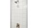Detail of a shower with white tiled walls and sleek fixtures at 2325 Mason Dr # D22, Atlanta, GA 30316