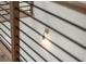 Contemporary staircase featuring modern railings and unique wall-mounted light fixture at 2325 Mason Dr # D22, Atlanta, GA 30316