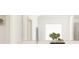 Bright bathroom with a white vanity, decorative plant, and natural light creating a serene atmosphere at 255 Deer Valley Run, Canton, GA 30115