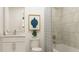 Stylish bathroom features modern tiling, updated vanity, and shower-tub combination at 255 Deer Valley Run, Canton, GA 30115