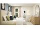 Bright bedroom with decor accents, ample dresser storage, and moon-themed art at 255 Deer Valley Run, Canton, GA 30115