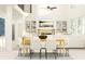 Open-concept dining area flows seamlessly, creating the perfect space for gatherings at 255 Deer Valley Run, Canton, GA 30115