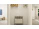 Organized laundry room with shelving, hamper, and functional design for convenient household tasks at 255 Deer Valley Run, Canton, GA 30115