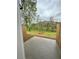 Concrete patio overlooking a lawn, trees, and a wooded stream in the background at 2832 Saratoga Lake Vw, Decatur, GA 30034