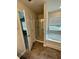 Bright bathroom featuring a shower and separate soaking tub by the window at 2832 Saratoga Lake Vw, Decatur, GA 30034
