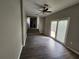 Spacious living room area featuring hardwood floors and access to the backyard at 3140 Kipling Dr, Powder Springs, GA 30127