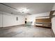 Spacious garage includes built in storage shelves and work surfaces at 11006 Clearwater Dr, Hampton, GA 30228