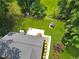Aerial view of the home showcasing the expansive backyard and mature trees at 1208 Brandl Sw Dr, Marietta, GA 30008