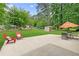 Spacious backyard with a patio, outdoor seating, and a storage shed at 1208 Brandl Sw Dr, Marietta, GA 30008