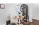 Breakfast nook featuring cabinet and round table for two near a window at 1208 Brandl Sw Dr, Marietta, GA 30008