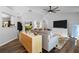 Open-concept living area with modern decor, including a stylish buffet and comfortable gray seating at 1208 Brandl Sw Dr, Marietta, GA 30008