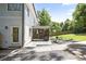 Backyard patio with grill, outdoor seating, and screened-in porch, perfect for entertaining at 1297 Conway Rd, Decatur, GA 30030