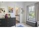 Warm Bedroom featuring light walls and trim, with a view to the en suite bathroom at 1297 Conway Rd, Decatur, GA 30030