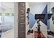 Home gym featuring an exercise bike and geometric accent wall in modern home at 1297 Conway Rd, Decatur, GA 30030